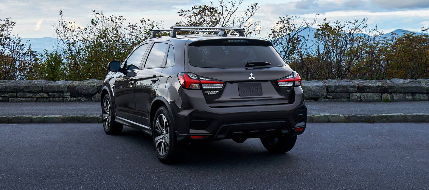 Backview of a brown 2026 Mitsubishi Outlander Sport SUV parked
