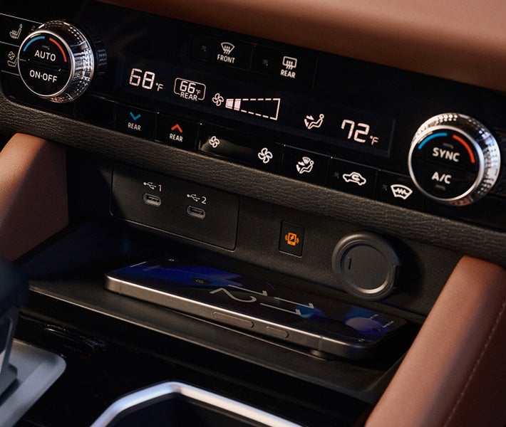 Close up off the wireless charging station in the 2026 Mitsubishi Outlander SUV