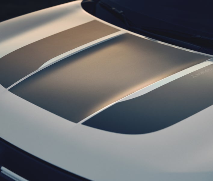 2025 Mitsubishi Outlander Trail Edition SUV with black hood graphics