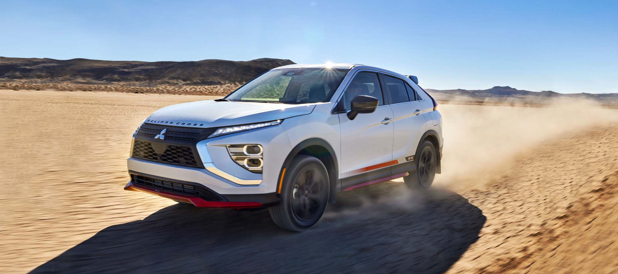 2023 Mitsubishi RALLIART Edition Eclipse Cross Compact SUV driving through the desert